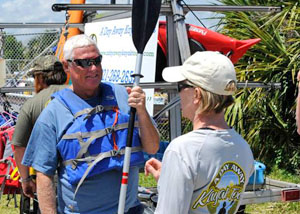 man with paddle